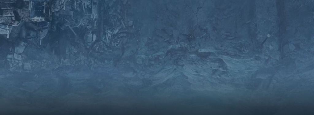 A road is seen broken down and ending in a giant crevasse.